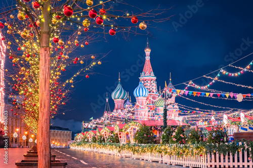 Christmas market in Moscow. New year celebrations in Russia. Christmas decorations on red square. St. Basil Cathedral on the background of festive decorations. New year in the capital of Russia.