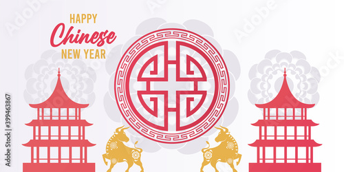 happy chinese new year lettering card with golden oxen and castles