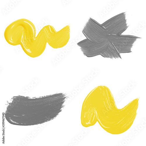 Yellow and gray cosmetic swatches on white