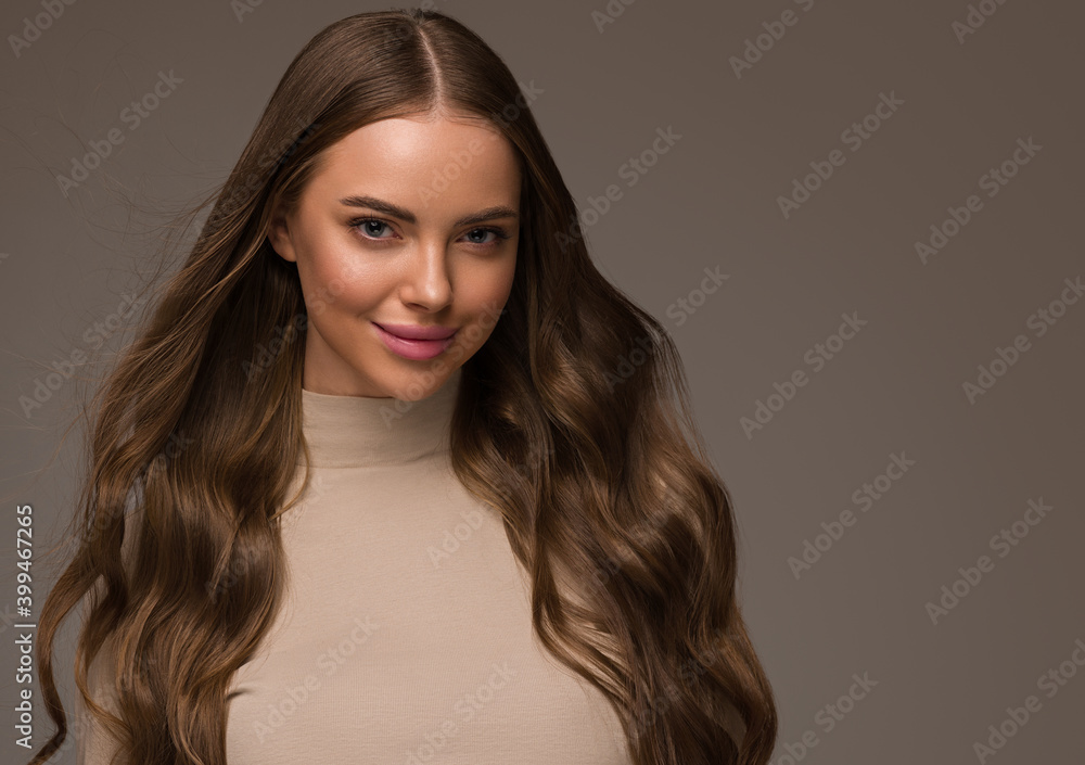 Beautiful woman female face with long healthy hair and beauty smile Beautiful woman female face with long healthy hair and beauty smile