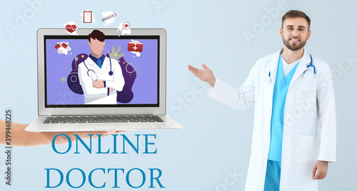 Portrait of male doctor sho...