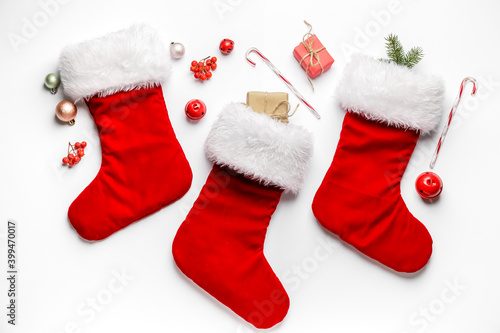 Composition with Christmas socks on white background