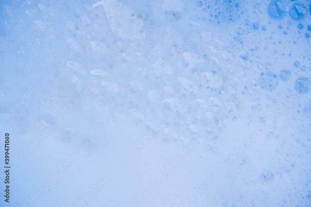 Obraz premium Abstract background white soapy foam texture. Shampoo foam with bubbles