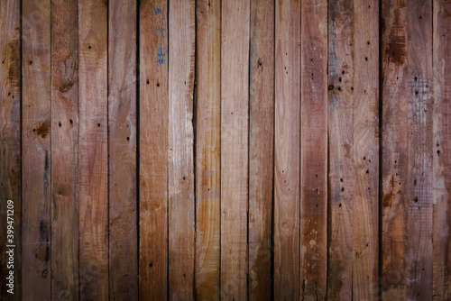 Vintage wood background texture for design floor panel siding and fence. Old pine natural plank table wall in summer. Light dark wooden board clear with pattern woodwork oak brown grain, timber rough.