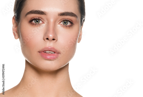 Beautiful woman face with natural make up healthy skin and beautiful eyes