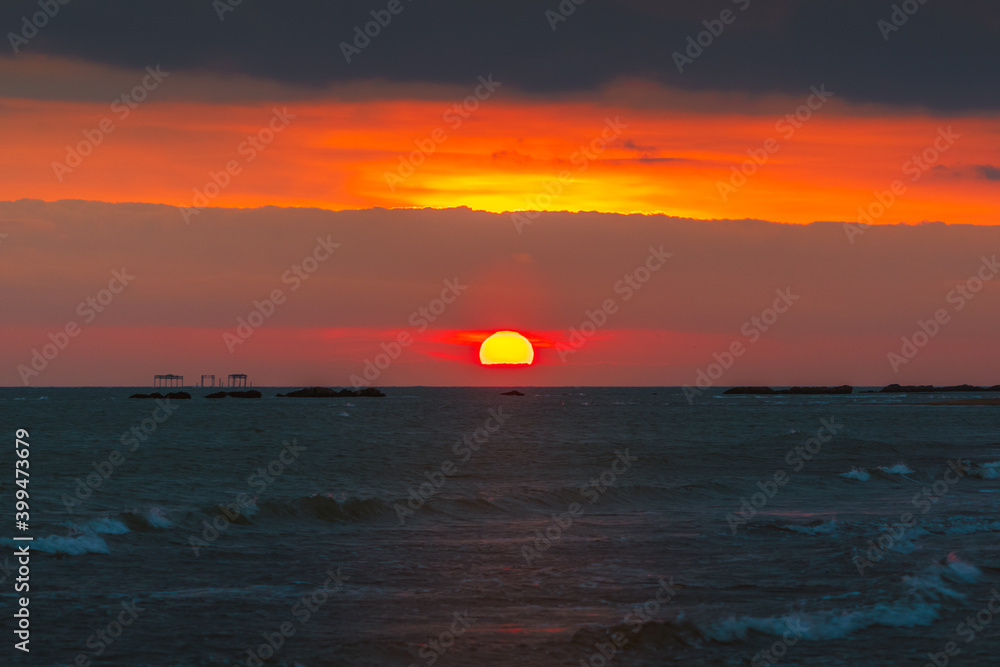 Dawn at sea, dramatic landscape