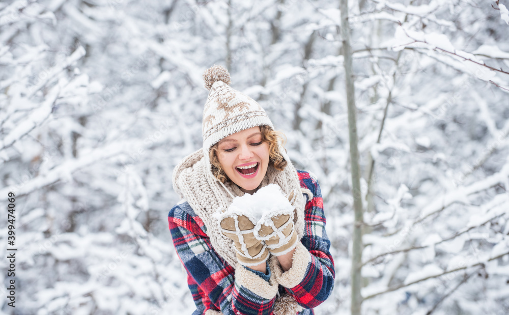 Fototapeta premium Winter admirer. Favorite season. Walk in snowy forest. Happy girl having fun outdoors. Christmas time. Winter outfit. Woman wear warm accessories stand in snowy nature. Winter fashion collection