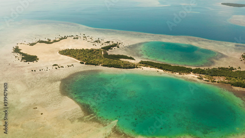 aerial view Honda bay with tropical islands and sandy beaches surrounded by coral reef with azure water. Summer and travel vacation concept, Puerto princesa, Palawan, Philippines.