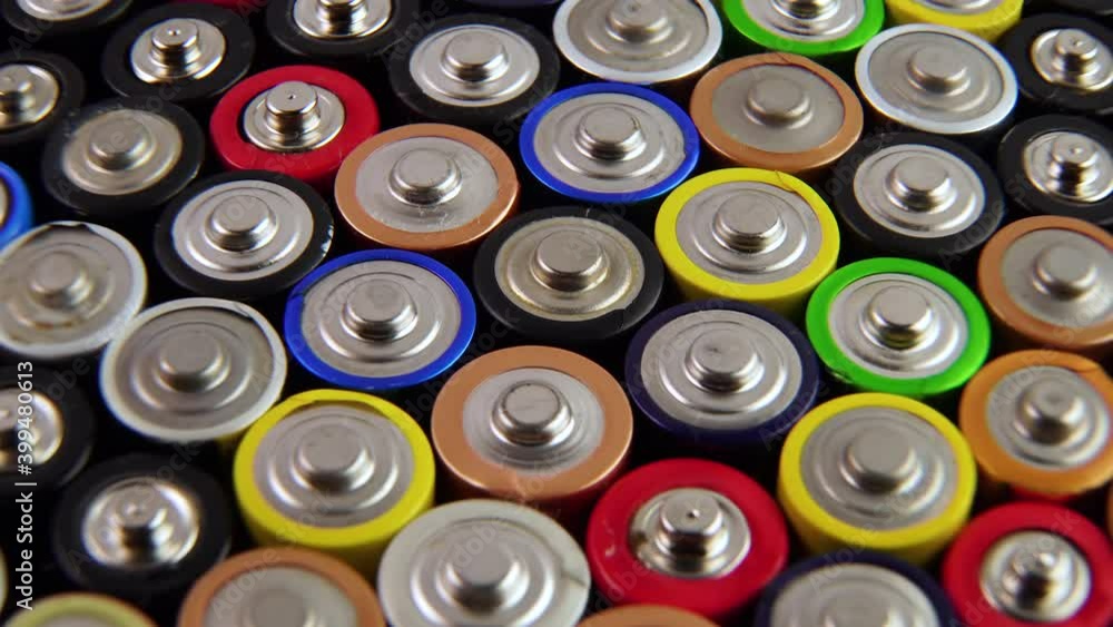 Closeup of used AA batteries. The finger batteries rotate. The harmful