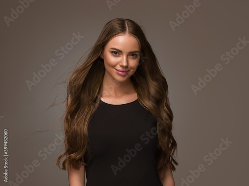 Beautiful woman model with long hair beauty natural make up fashion hairstyle