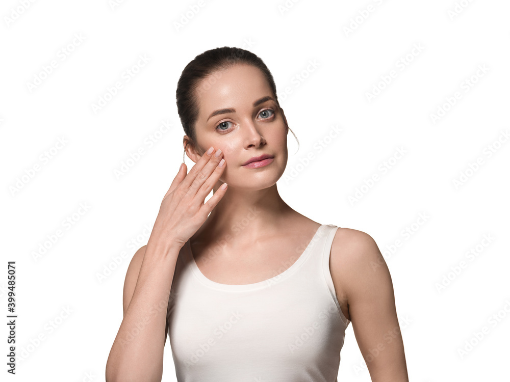 Beautiful woman with clean face skin hands manicure natural touching face Beautiful woman with clean face skin hands manicure natural touching face