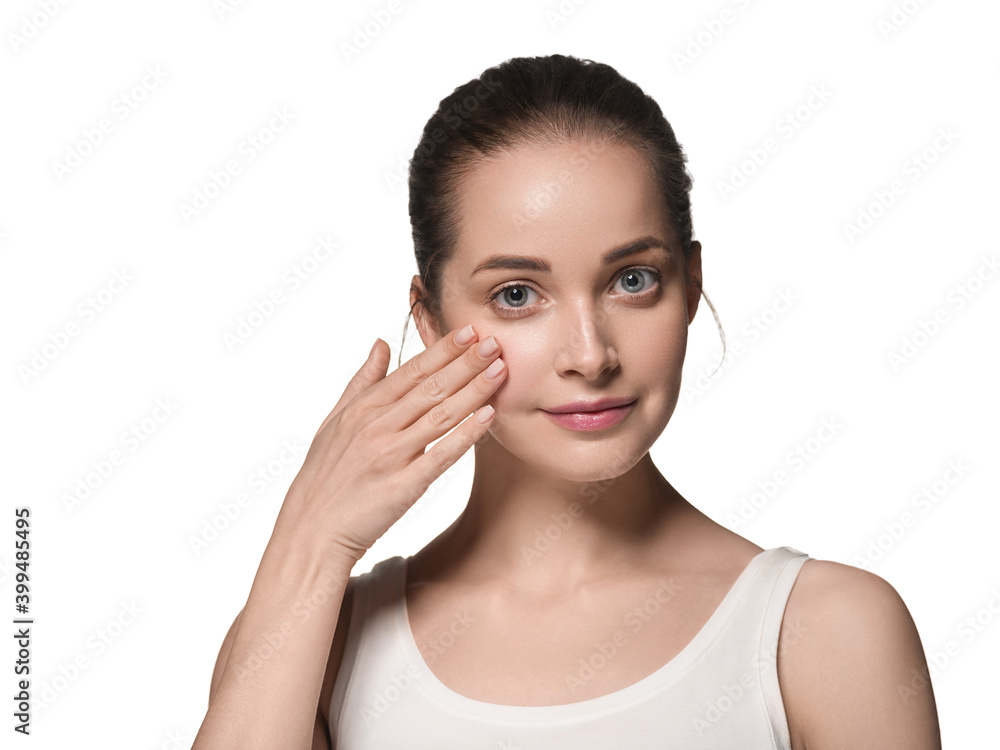 Beautiful woman with clean face skin hands manicure natural touching face Beautiful woman with clean face skin hands manicure natural touching face
