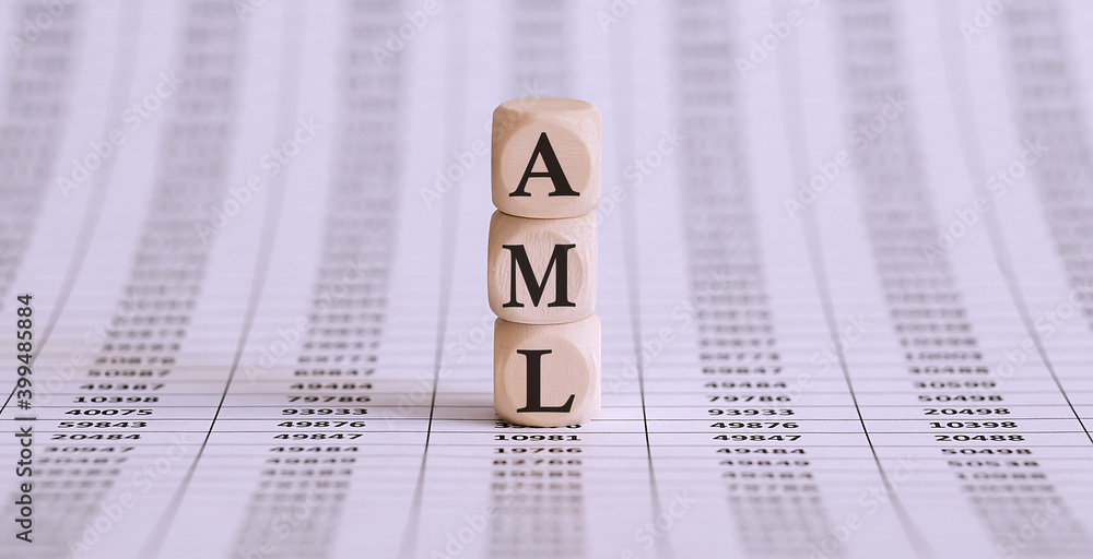 Money laundering concept, wooden word block AML on chart Stock-Foto ...