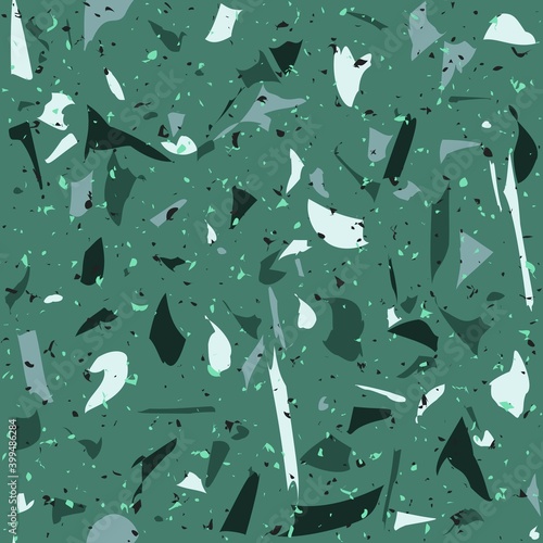 Green terrazo seamless pattern for tiles and faience. Italian mosaic with rock fragments and pieces repetitive background.