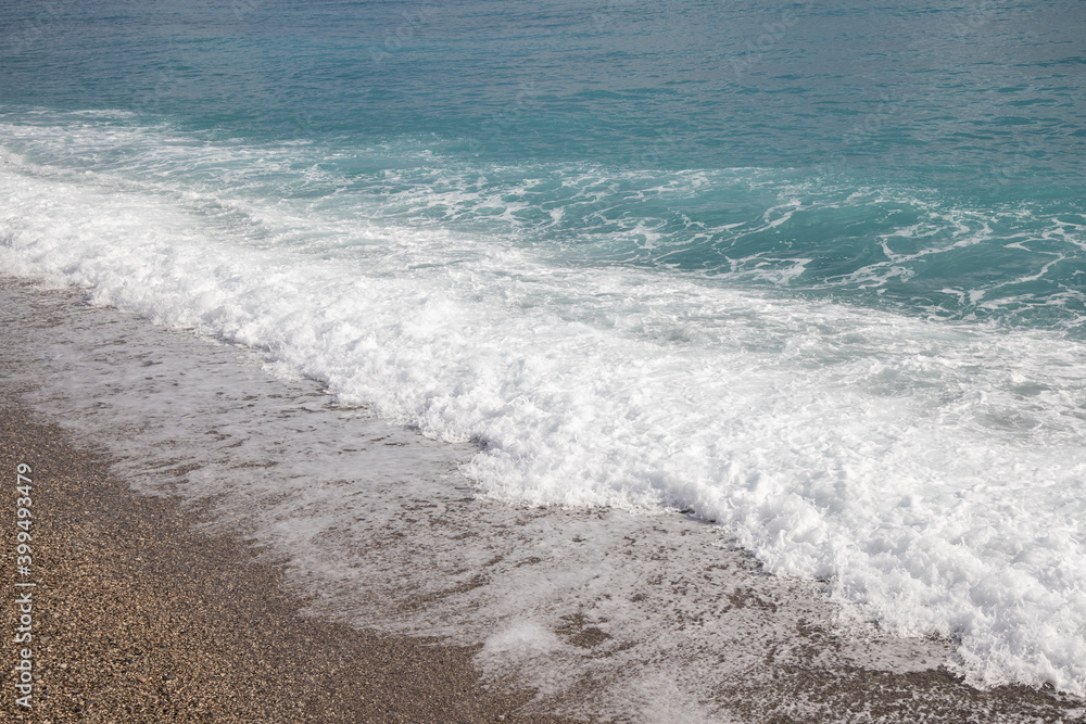 waves on the beach after rain