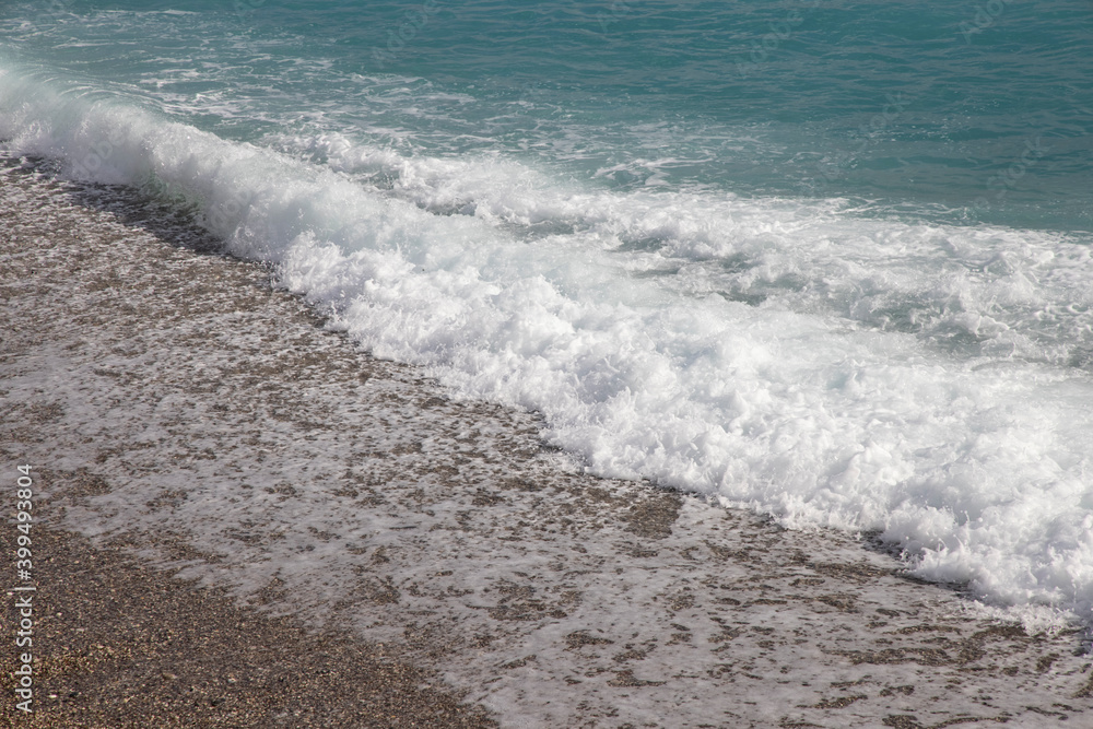waves on the beach after rain waves on the beach after rain