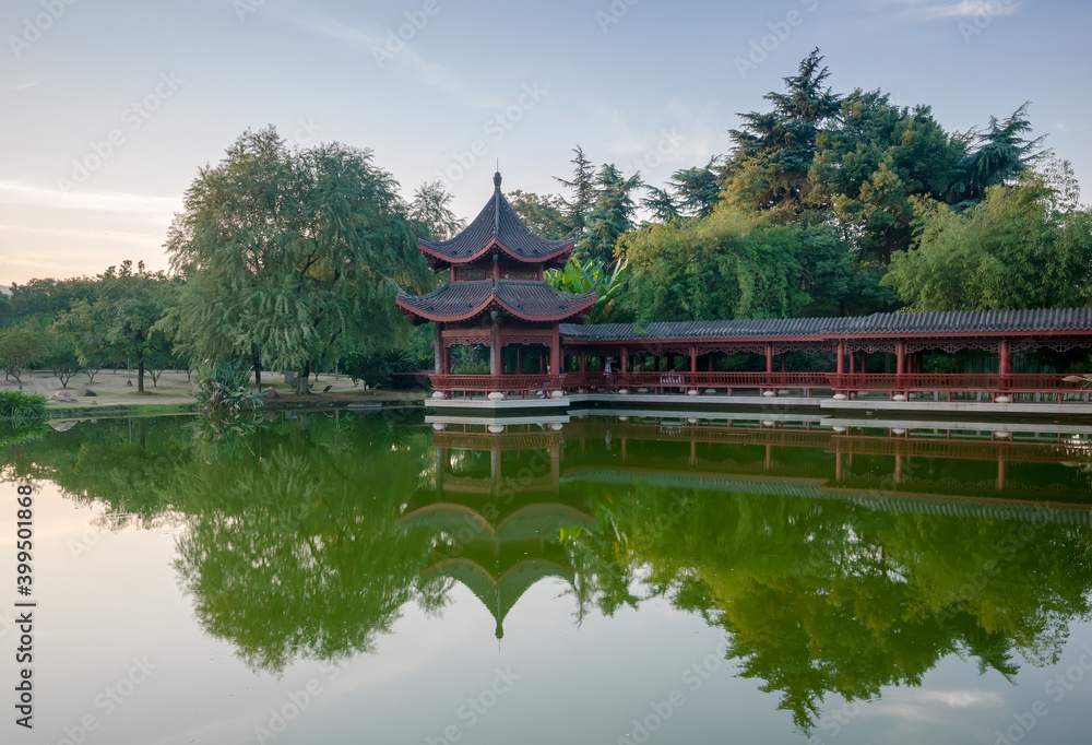 Chinese building is reflected on the surface of the lake Chinese building is reflected on the surface of the lake