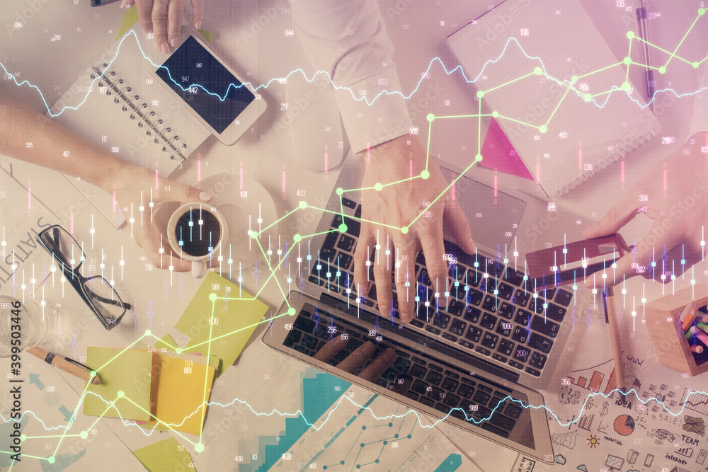 Multi exposure of man's hands typing over computer keyboard and forex graph hologram drawing. Top view. Financial markets concept. Multi exposure of man's hands typing over computer keyboard and forex graph hologram drawing. Top view. Financial markets concept.