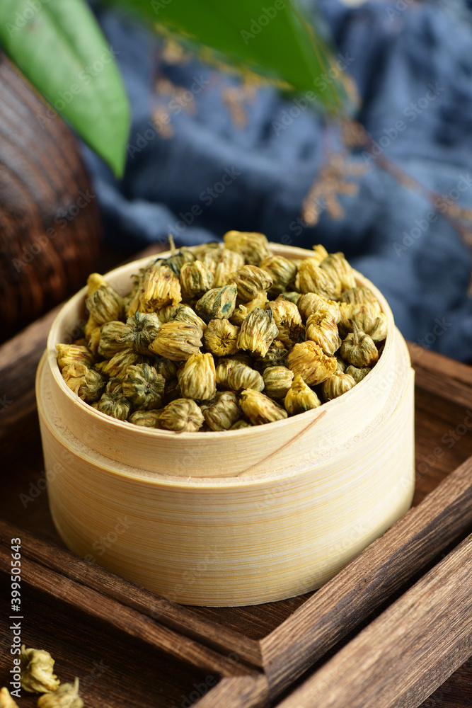 Close-up pictures of fetal chrysanthemum on the background of retro Chinese style Close-up pictures of fetal chrysanthemum on the background of retro Chinese style