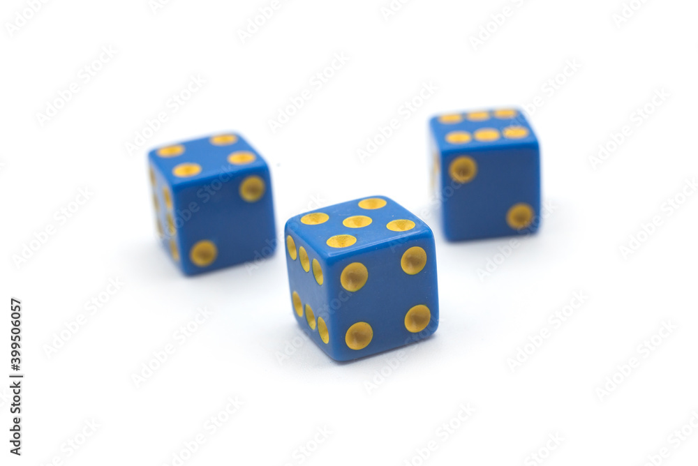 Closeup of blue roll dices on white background Closeup of blue roll dices on white background