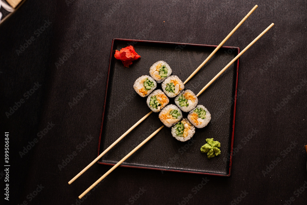 sushi hot rolls on black background dish japanese cuisine sushi hot rolls on black background dish japanese cuisine