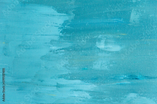 abstract colored background from stained colored oil paint on linen canvas
