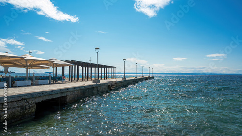 Pier with cafe in Nikiti, Greece © frimufilms