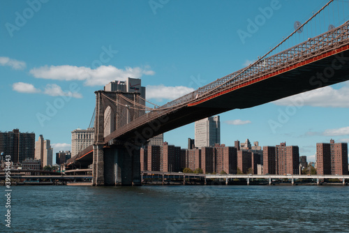 View of the New York City, with the Brooklyn Bridge over the river. © fernando