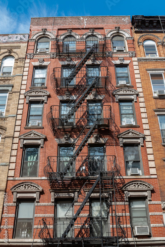 Brooklyn buildings. Exposed bricks and fire escapes.