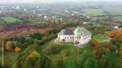 Olesko Palace from the air. Reserve. Summer park on the hills. Aerial view of the Olesky Castle, Ukraine. photo