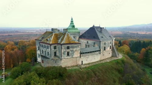 Olesko Palace from the air. Reserve. Summer park on the hills. Aerial view of the Olesky Castle, Ukraine. photo