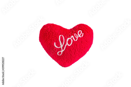 Red soft plush heart with the inscription Love on a white background, isolate. valentine's day, dating, feelings, gifts