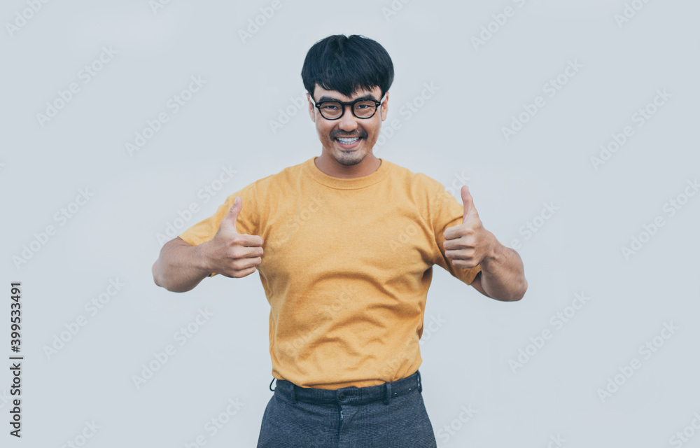 Naklejka premium adult asian man.young male wear eye glasses.posing smiling look excited surprised thinking positive happy joy life.empty,copy space for text advertising.white background.attractive fashion people