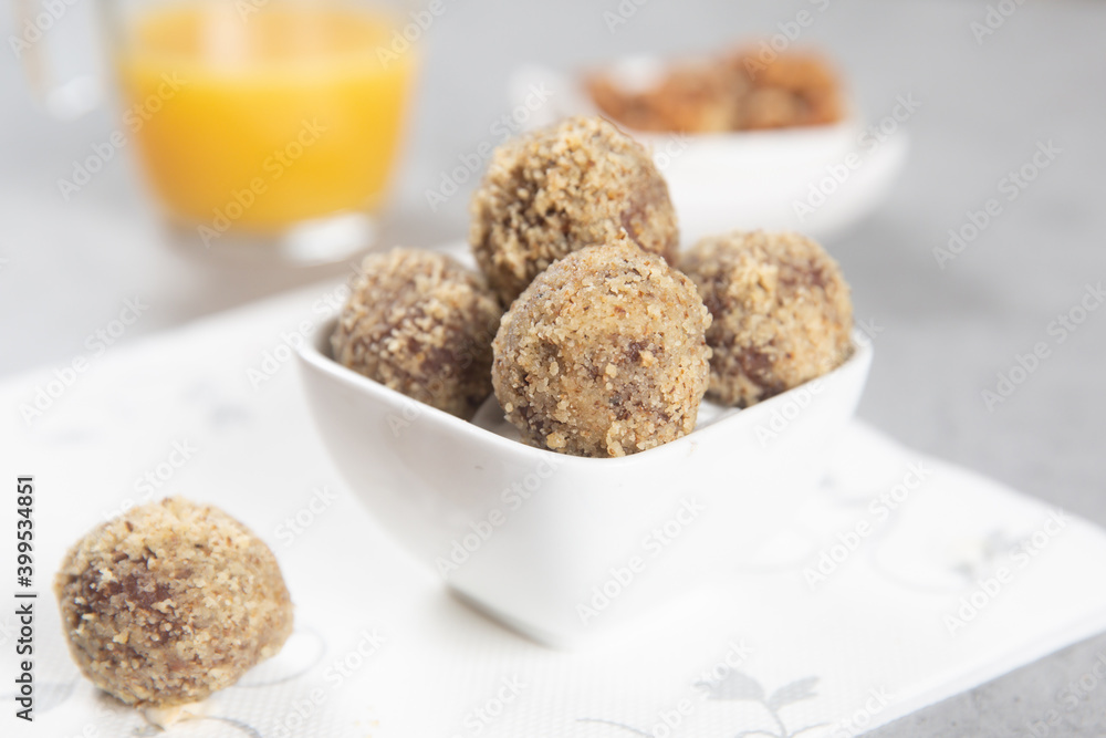 Cake balls with almonds, biscuits and orange juice Cake balls with almonds, biscuits and orange juice