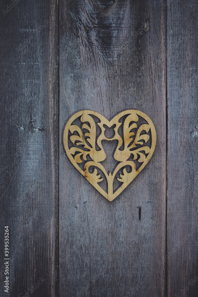 valentine's day background with wooden beautiful heart on wooden background valentine's day background with wooden beautiful heart on wooden background