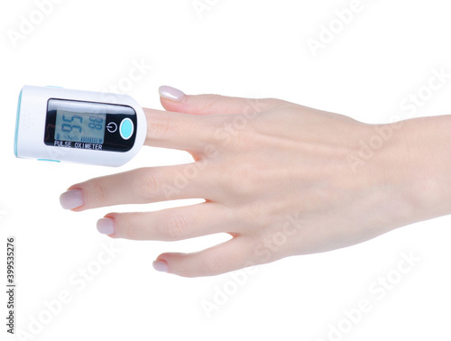 Pulse Oximeter equipment in hand on white background isolation