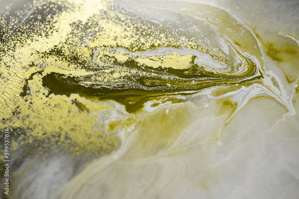 Abstraction. Fluid art. Yellow and grey. Natural luxury. The style includes swirls of marble or ripples of agate. Very beautiful yellow paint with the addition of gold powder Abstraction. Fluid art. Yellow and grey. Natural luxury. The style includes swirls of marble or ripples of agate. Very beautiful yellow paint with the addition of gold powder