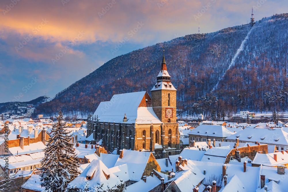 Brasov, Romania. Panoramic view of the old town and Tampa mountain in winter.