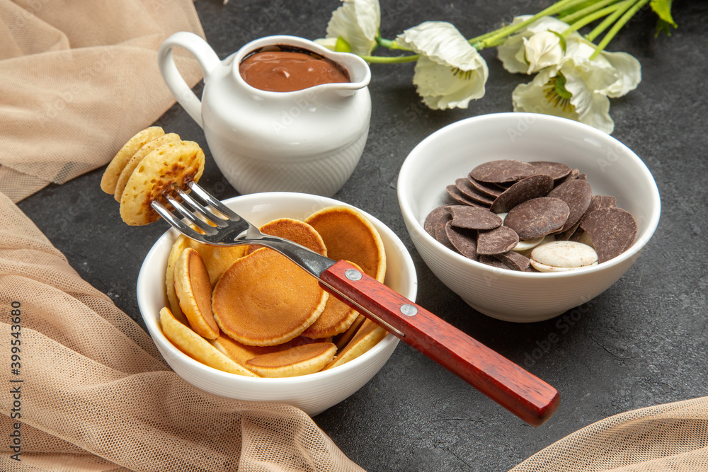 front view sweet pancakes with choco cookies on dark background sweet biscuit cake front view sweet pancakes with choco cookies on dark background sweet biscuit cake