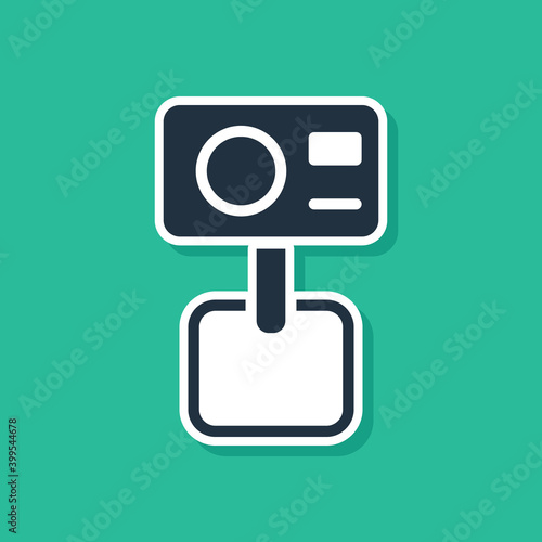 Blue Action extreme camera icon isolated on green background. Video camera equipment for filming extreme sports. Vector.