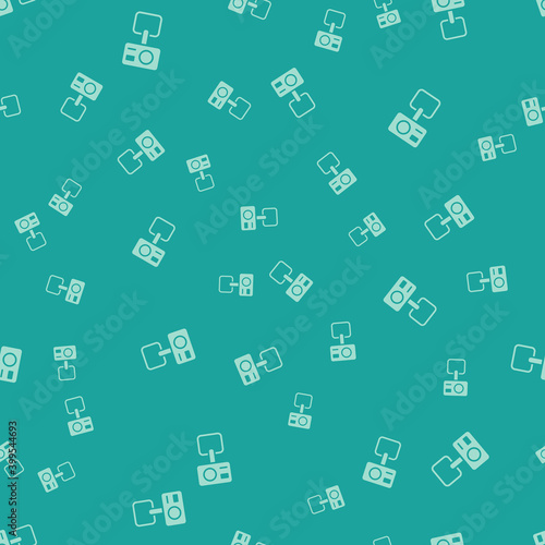 Green Action extreme camera icon isolated seamless pattern on green background. Video camera equipment for filming extreme sports. Vector.
