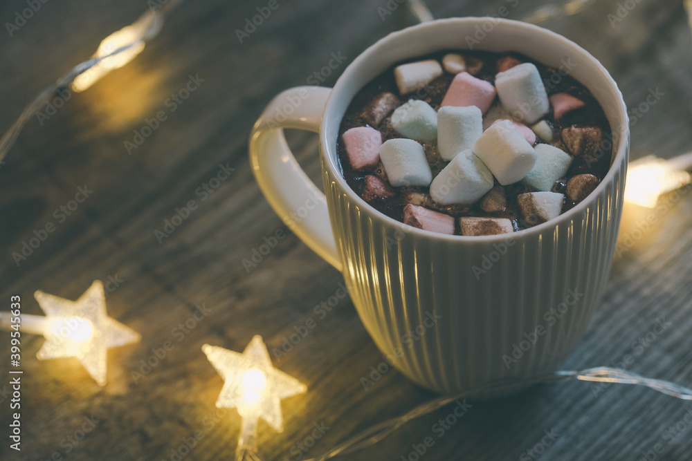 Cup of hot cocoa with marshmallows on the wooden table, top view Cup of hot cocoa with marshmallows on the wooden table, top view