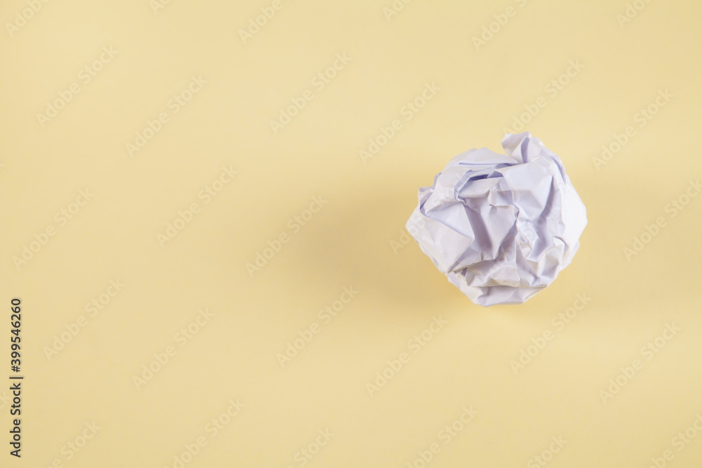 Crumpled paper, on an isolated yellow background. Crumpled paper, on an isolated yellow background.
