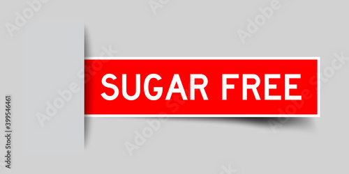 Inserted red color sticker label with word sugar free on gray background