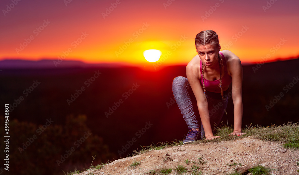 Fitness Woman on Hills at Sunset