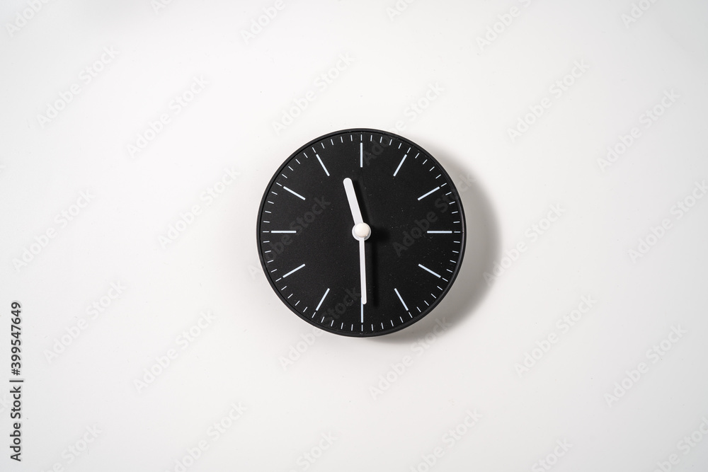 close up of an office clock on white background with clipping path