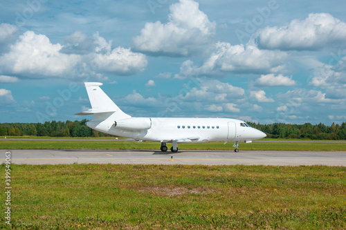 White reactive private jet, taxi to take off.