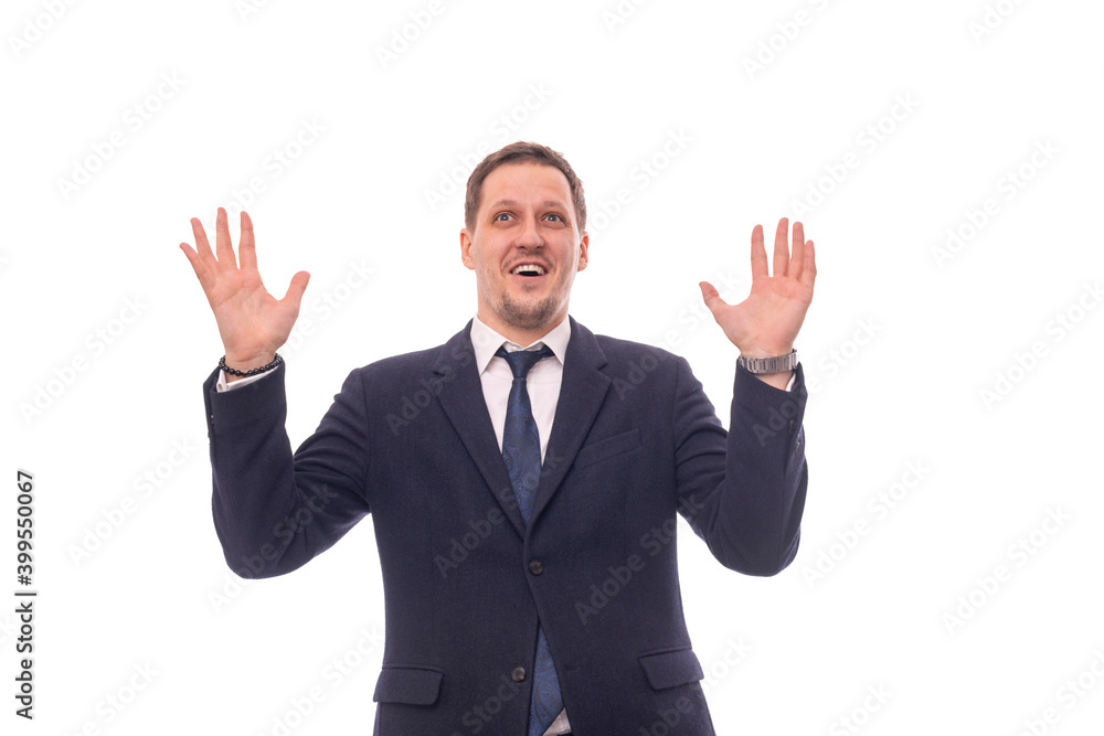Young energizing man raised his hands up admiring what, isolated Young energizing man raised his hands up admiring what, isolated