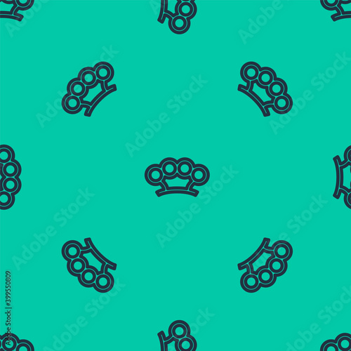 Blue line Brass knuckles icon isolated seamless pattern on green background. Vector.