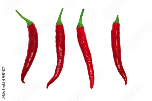 Red chilli in nature Red pepper top view Fresh food ingredients Flavoring and spices Isolated on white background